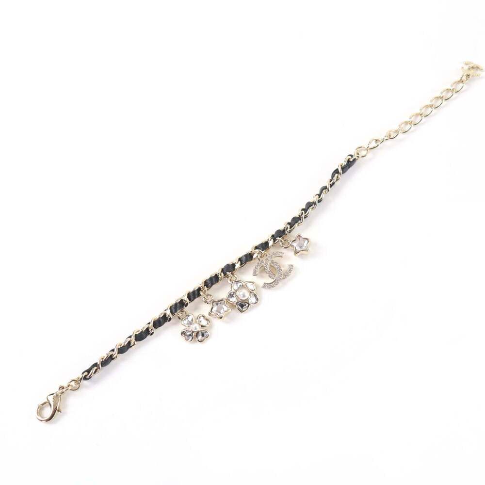 CHANEL Authentic Black Logo Charm Bracelet - Picture 4 of 5